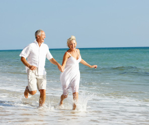 Couple Running on Beach